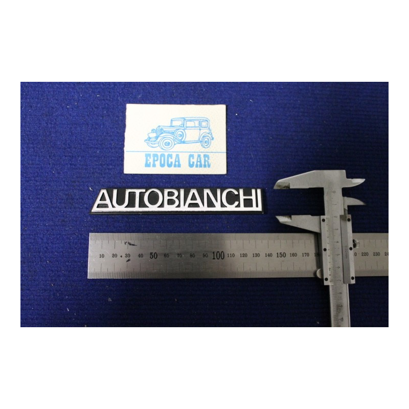 EMBLEM "AUTOBIANCHI"  METAL CHROME IN PLASTIC BACKGROUND